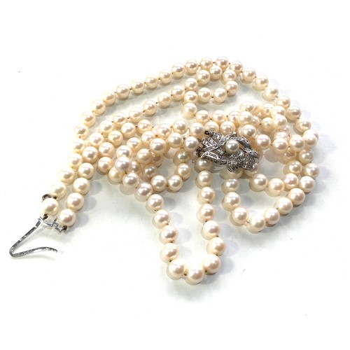 388 - Fine 18ct white gold and diamond clasp double row pearl necklace clasp measures approx 3.7cm by 2.3c... 