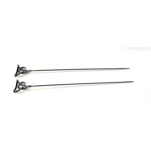 472 - 2 antique Charles Horner silver hatpins each measures  approx 21cm long in uncleaned condition