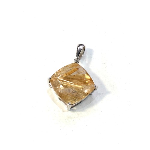 391 - 9ct white gold rutilated quartz pendant measures approx 2.9cm drop by 2cm wide weight 3.6g