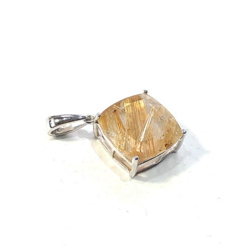 391 - 9ct white gold rutilated quartz pendant measures approx 2.9cm drop by 2cm wide weight 3.6g