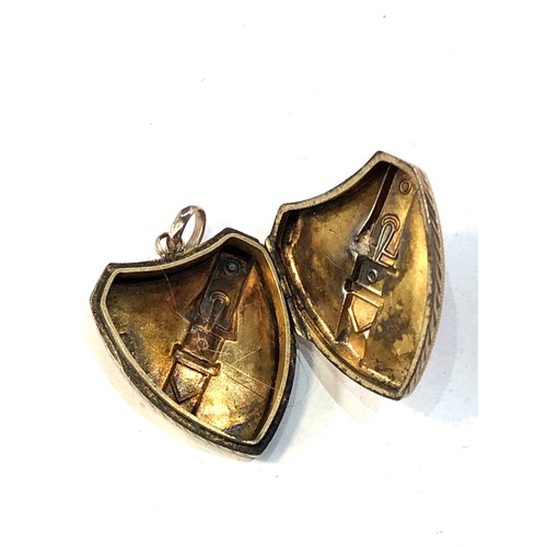 394 - Antique 9ct gold sheild and buckle locket measutres approx 2.7cm drop by 2cm wide weight 2.8g