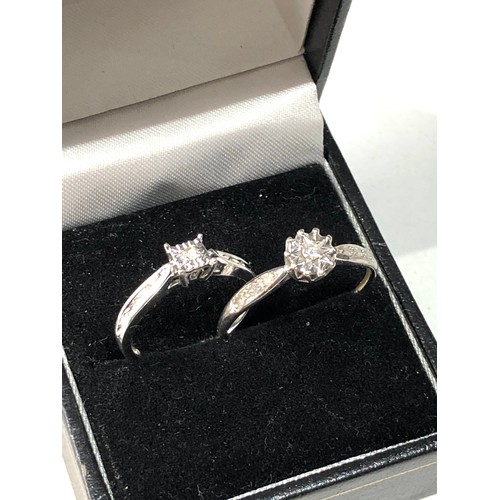 402 - 2 9ct gold diamond rings 3.4g