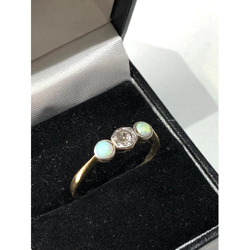 411 - 18ct gold diamond and opal ring weight 2g