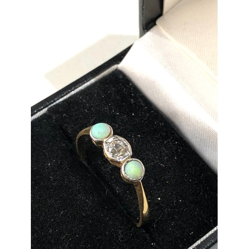 411 - 18ct gold diamond and opal ring weight 2g