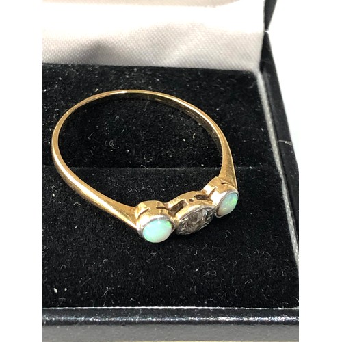 411 - 18ct gold diamond and opal ring weight 2g