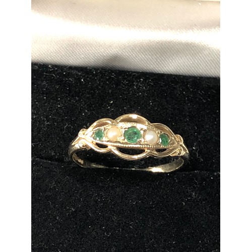 412 - 9ct gold Emerald and pearl gypsy ring weight 2g