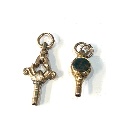 397 - 2 9ct gold antique watch keys