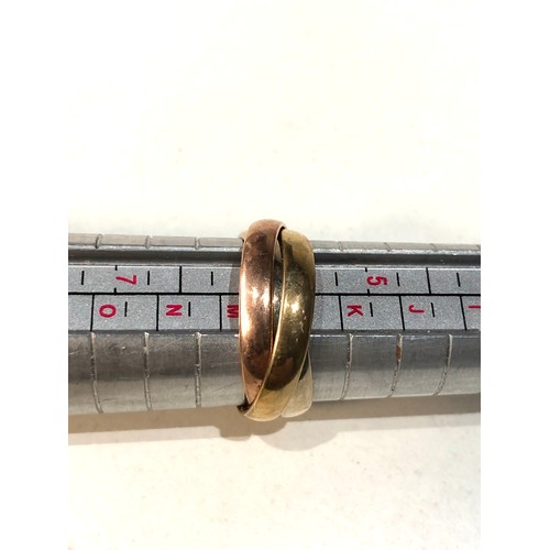 404 - 9ct gold russian roll over wedding band 3.9g