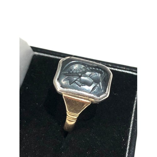 426 - 9ct gold and silver top intaglio ring weight 7.7g