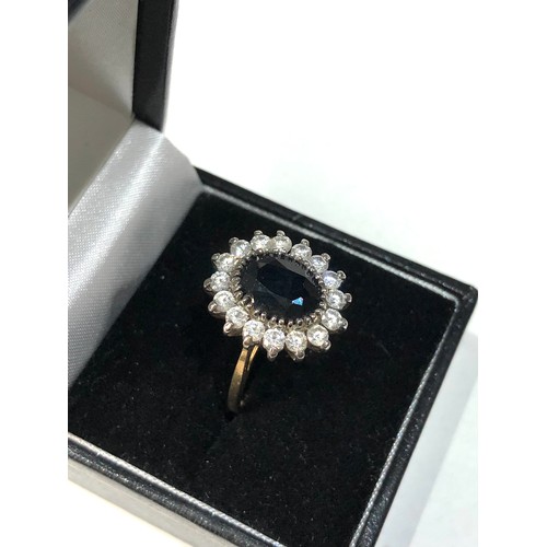 414 - 9ct gold sapphire and cz cocktail ring 4.7g