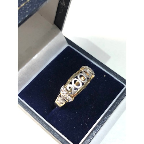 457 - 9ct gold diamond millennium ring size t-u 3.5g