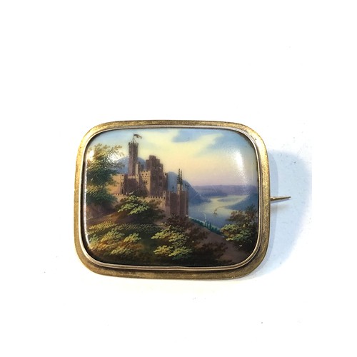 458 - Gold framed scenic painted ceramic panel brooch measures approx 4.2cm by 3.4cm xrt tested as 12ct go... 