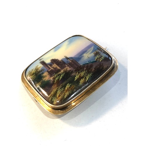 458 - Gold framed scenic painted ceramic panel brooch measures approx 4.2cm by 3.4cm xrt tested as 12ct go... 