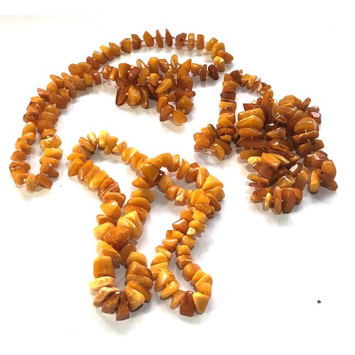 65 - 3 antique egg yolk amber bead piece necklaces total weight 186g