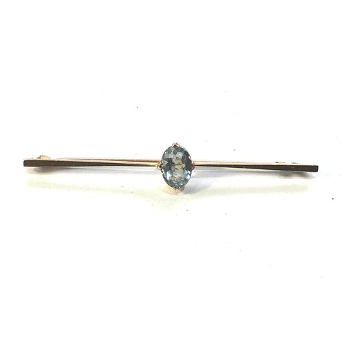 67 - Antique 9ct gold and aquamarine coloured stone bar brooch measures approx 61mm wide gem measures app... 