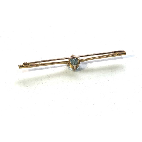 67 - Antique 9ct gold and aquamarine coloured stone bar brooch measures approx 61mm wide gem measures app... 