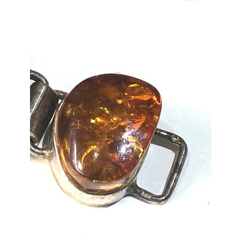 340 - Vintage chunky silver and amber bracelet measures approx 18.5cm long by 2.3cm wide weight 52g