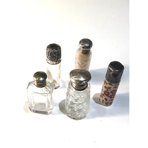 3 - 5 small antique silver top scent bottles largest measures approx 6.2cm age related bumps and dents t... 