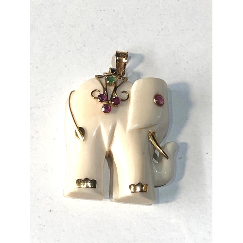 70 - 14ct gold and gem set elephant pendant measures approx 3.2cm drop by 2.2cm wide hallmarked 585