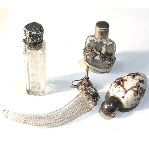4 - 4 small antique silver top scent bottles largest measures approx 9cm lid hinge pin missing  age rela... 