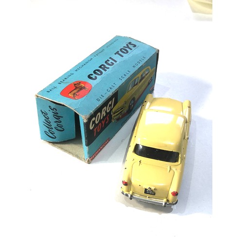 534 - Corgi Toys no.207M Standard Vanguard mechanical yellow in original blue box 1 flap missing