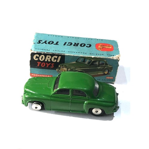 538 - Corgi 204M mechanical Rover 90 saloon in original box  poor condition flaps missing  in good used co... 