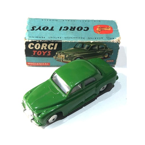 538 - Corgi 204M mechanical Rover 90 saloon in original box  poor condition flaps missing  in good used co... 