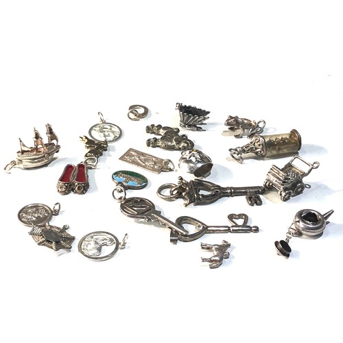 346 - Selection of vintage silver charms weight 50g