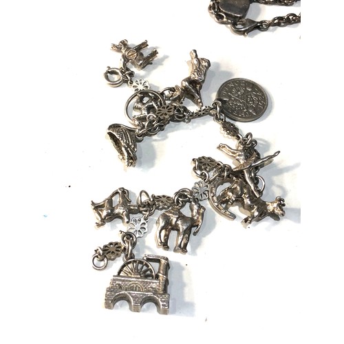 347 - 3 vintage silver charm bracelets weight 64g