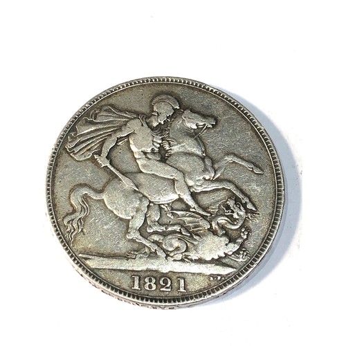 476 - George 1111 1821 silver crown  coin has been brooched