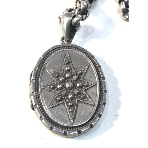 401 - Victorian silver locket and chain locket measures approx 4.5cm drop by 2.6cm wide