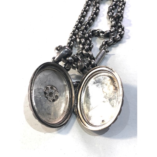 401 - Victorian silver locket and chain locket measures approx 4.5cm drop by 2.6cm wide