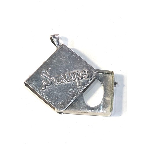 61 - Modern silver stamp case measures approx 3.3cm by 2.8cm