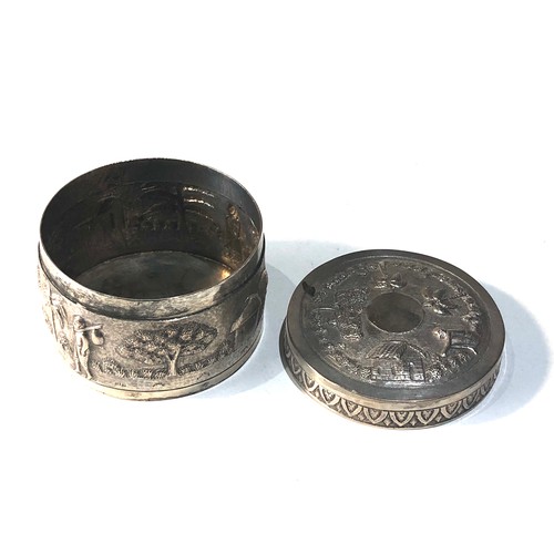 36 - Antique indian silver trinket box scenic embossed design  measures approx 7cm dia height 5cm xrt 800... 