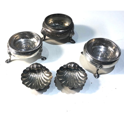55 - Selection of silver items includes pair of shell salts another pair of georgian silver glass lined s... 