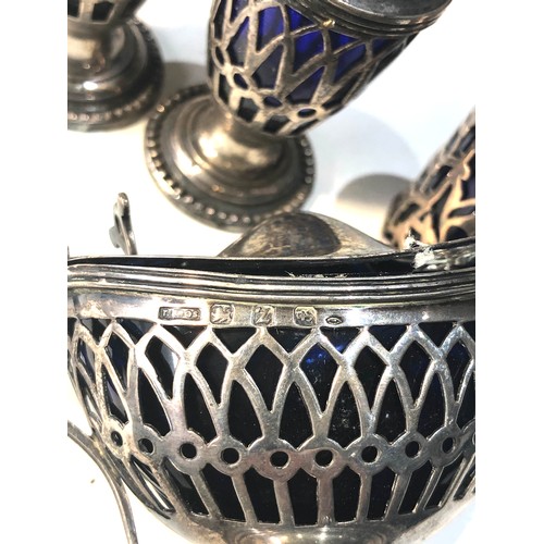 43 - Antique silver cruet set blue glass liners Birmingham silver hallmarks