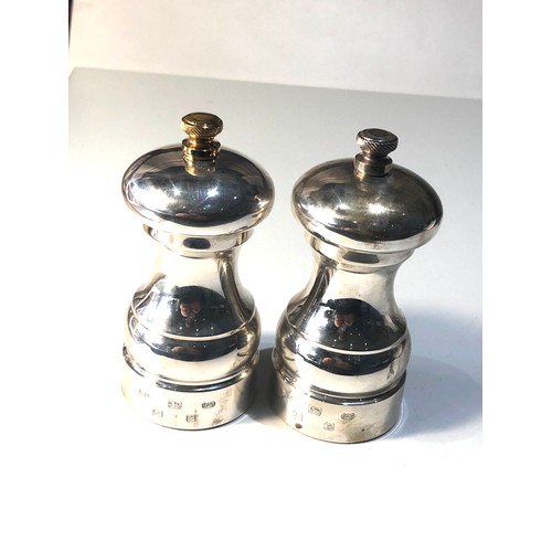 30 - 2 Large hallmarked silver salt and pepper grinders Birmingham silver hallmarks measure height 10.5cm