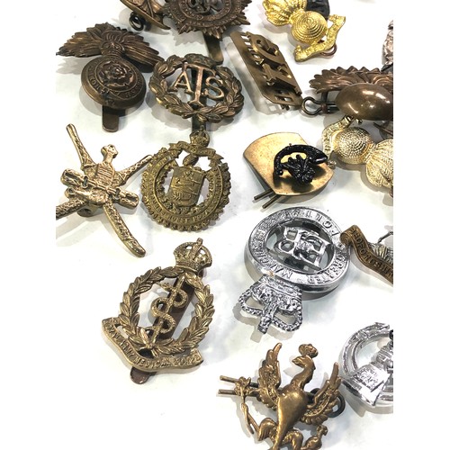 464 - Collection of military & police badges cap and collar and shoulder