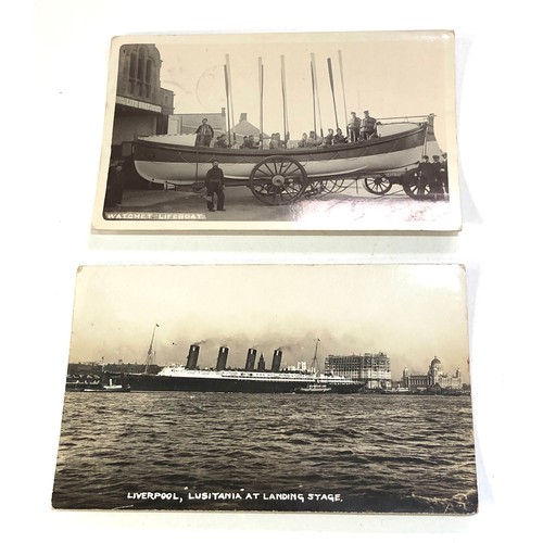 497 - 2 fine antique real photo postcards Liverpool Lusitania at landing and Watchet lifeboat and crew