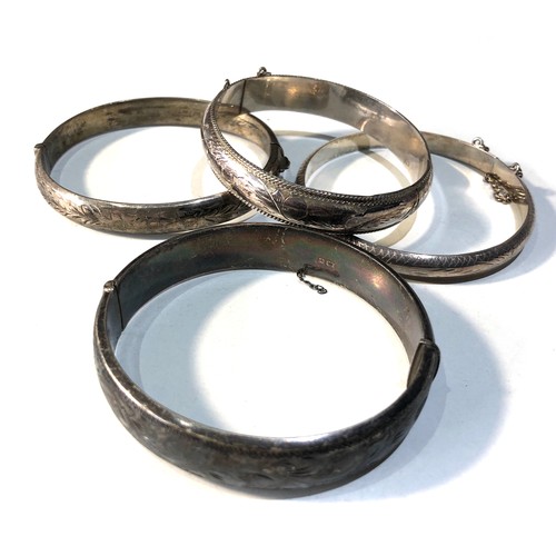 357 - 4 vintage silver bangles weight 55g