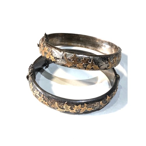 367 - 2 vintage silver & gold bangles 41g