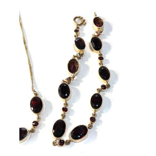 224 - 9ct gold garnet bracelet and necklace weight 13.9g good condition