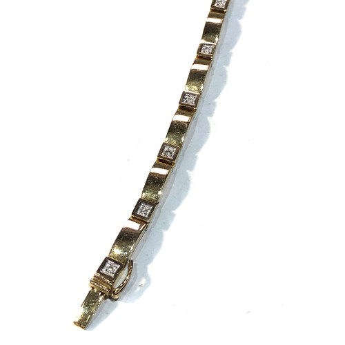 172 - 9ct gold diamond bracelet measures approx 20cm long by 3mm wide weight 8.6g good condition