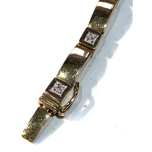 172 - 9ct gold diamond bracelet measures approx 20cm long by 3mm wide weight 8.6g good condition