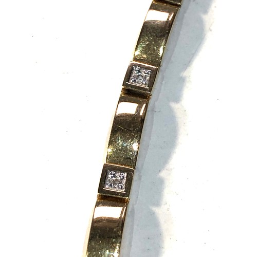 172 - 9ct gold diamond bracelet measures approx 20cm long by 3mm wide weight 8.6g good condition