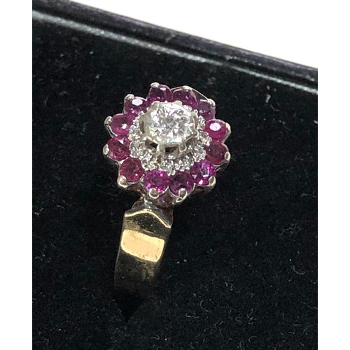 174 - 9ct gold diamond and ruby ring weight 3.2g