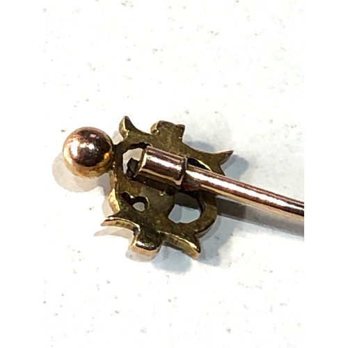 256 - 9ct gold enamel football charity match stick pin measures approx 5.7cm long weight 1.1g