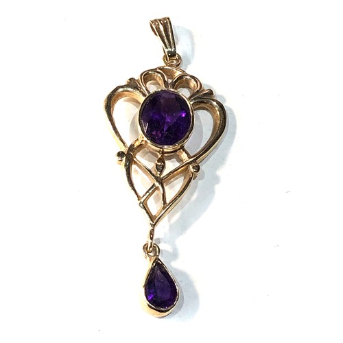 326 - 9ct gold amethyst pendant measures approx 5.1cm drop by 1.9cm weight 4g