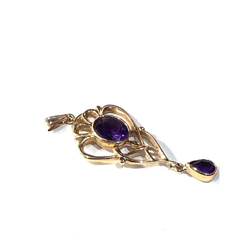 326 - 9ct gold amethyst pendant measures approx 5.1cm drop by 1.9cm weight 4g