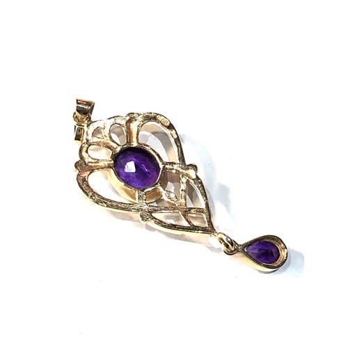 326 - 9ct gold amethyst pendant measures approx 5.1cm drop by 1.9cm weight 4g